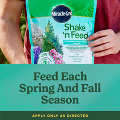 Miracle-Gro Shake 'N Feed Flowering Trees & Shrubs Plant Food in garden setting