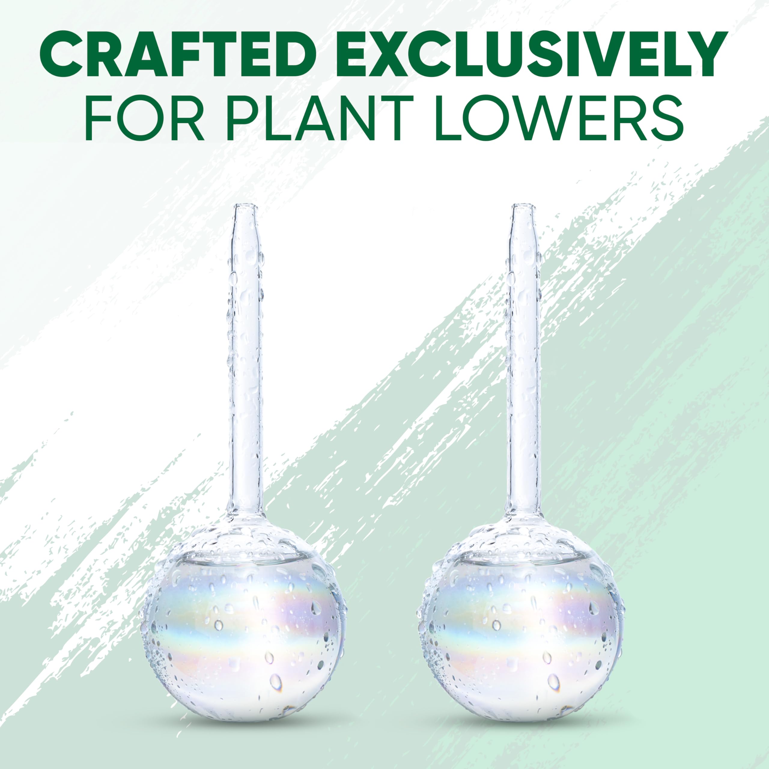 Mission Gallery watering globes set on a green garden background