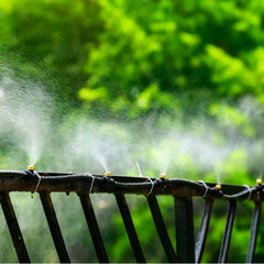 Misting nozzles in use on a patio for outdoor cooling
