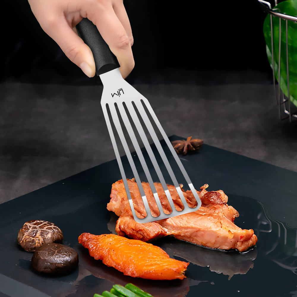 MIU France Fish Spatula resting on a grill