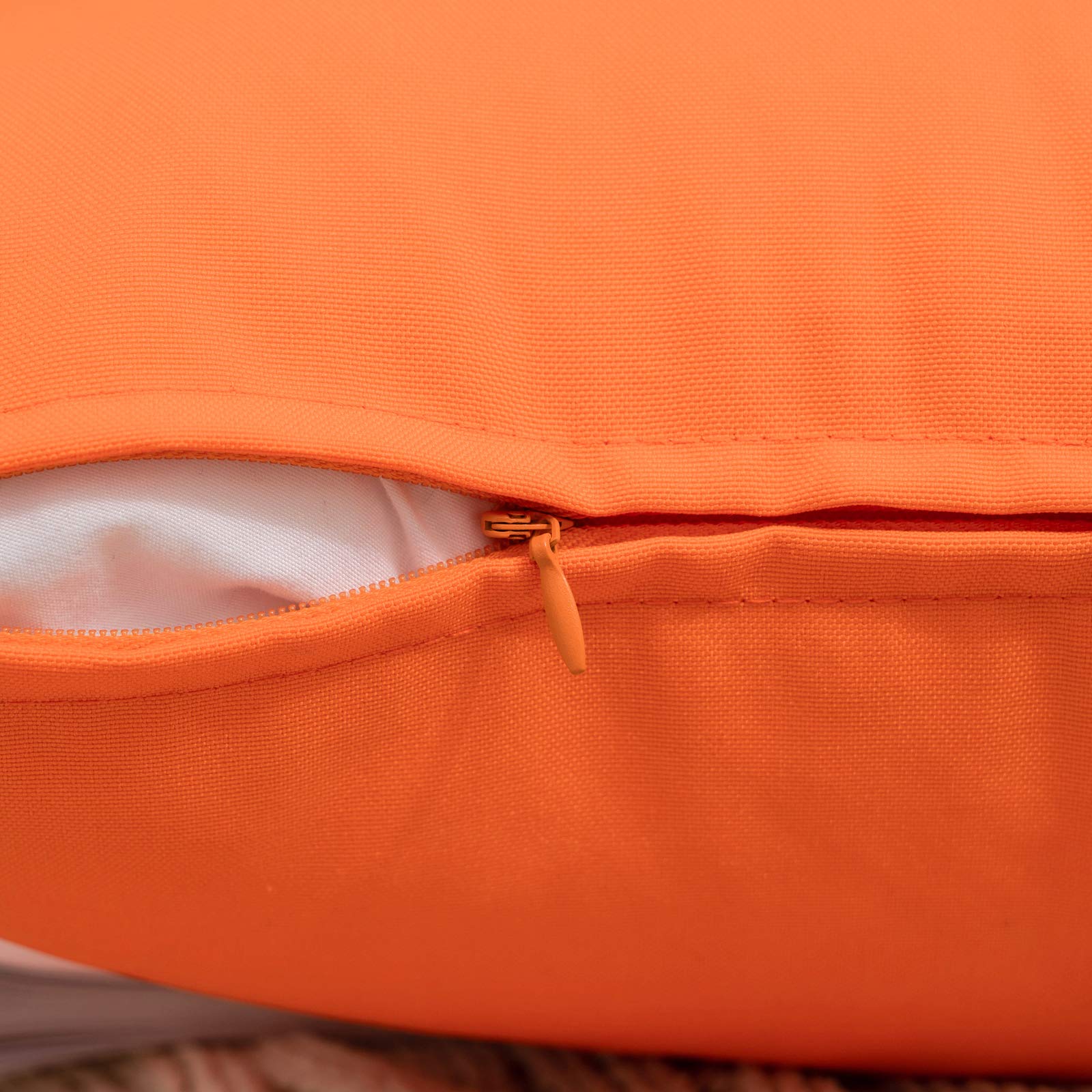 MIULEE pillow covers stacked displaying orange colour