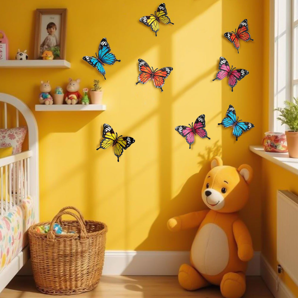 Mixed color metal butterflies on a wooden background