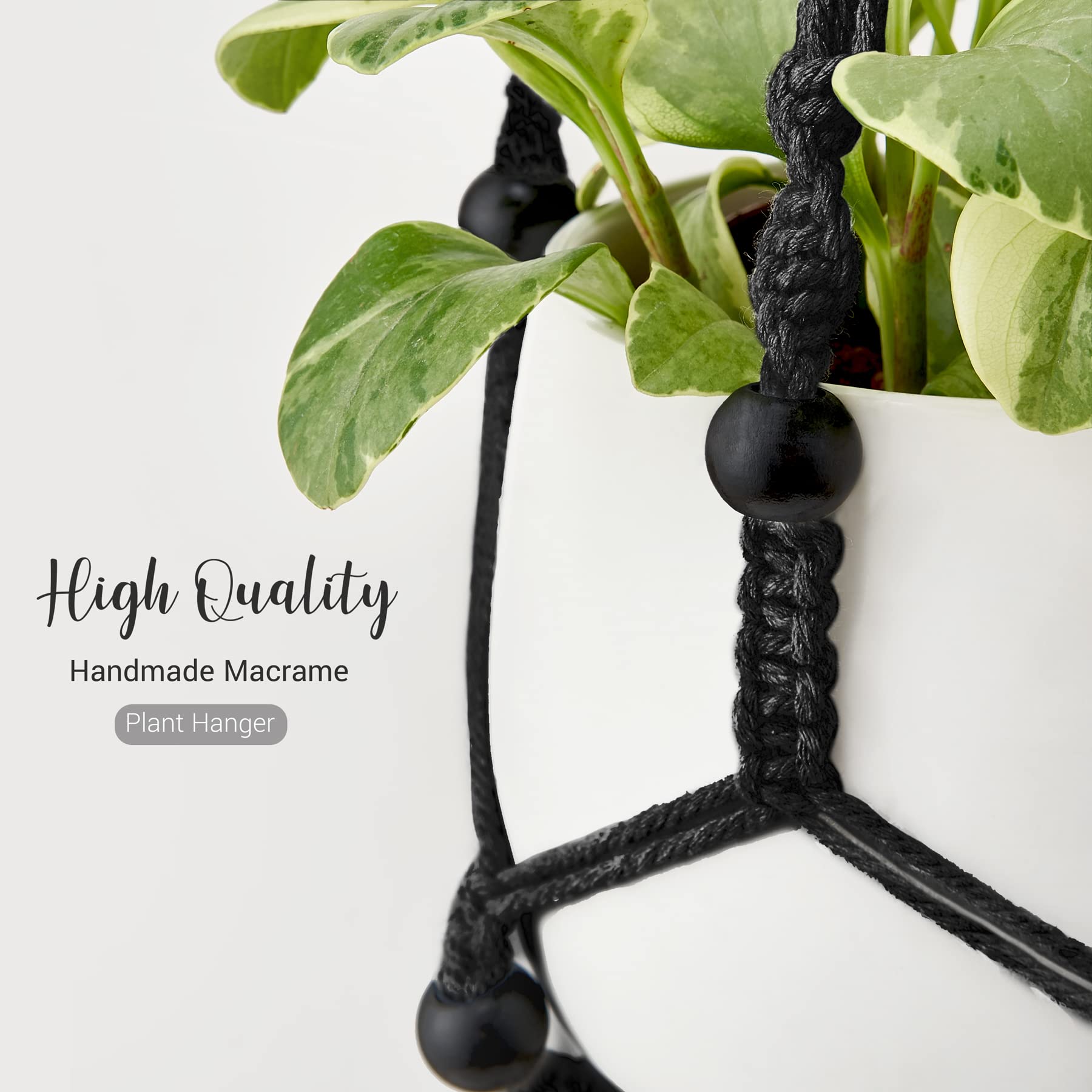 Mkono macrame plant hanger black cotton in a living room setting