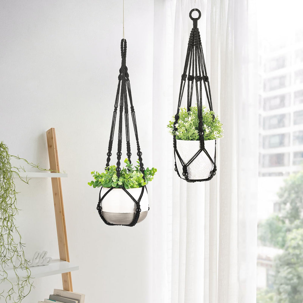 Mkono macrame plant hanger installed by a window