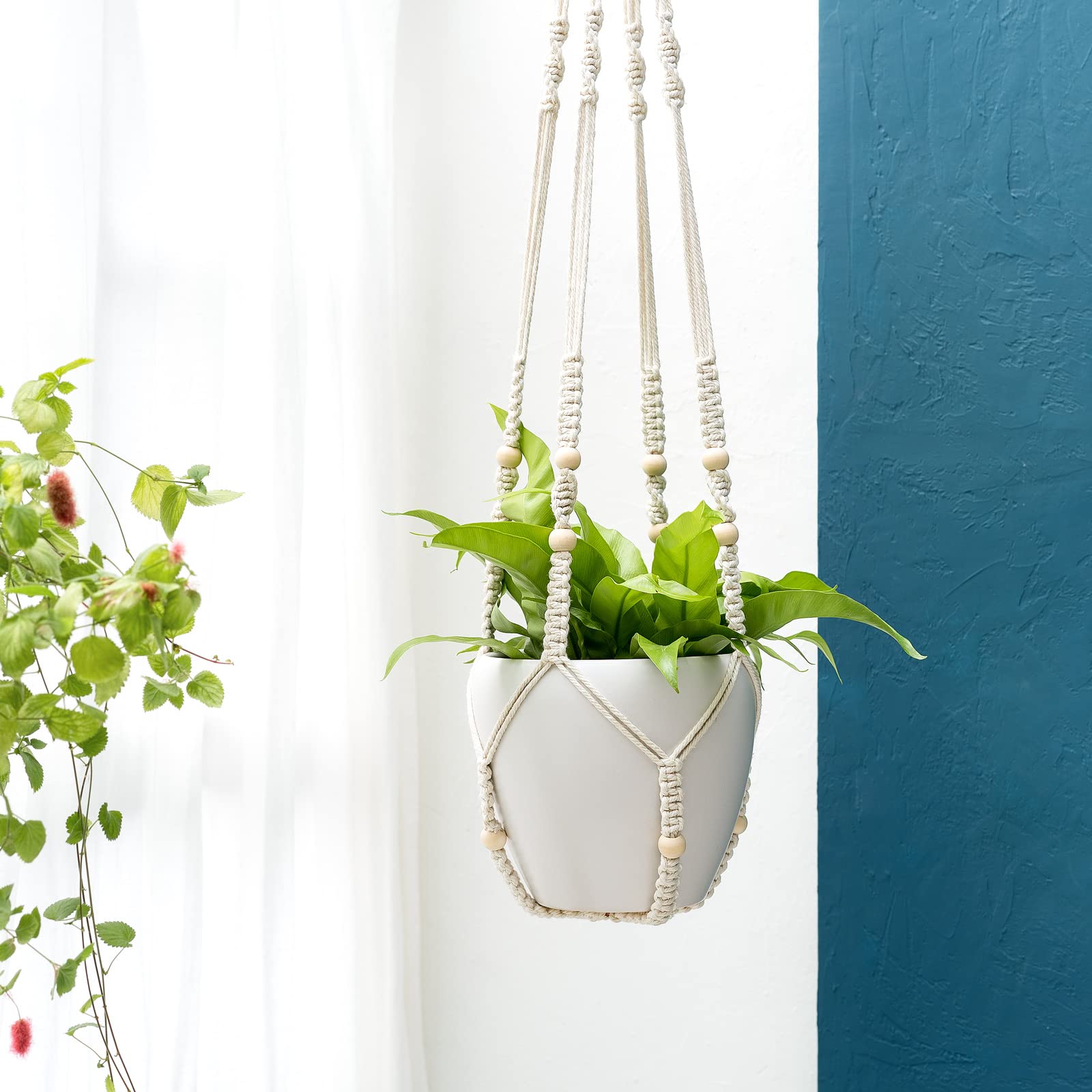 Mkono plant hanger displayed indoors with a potted plant