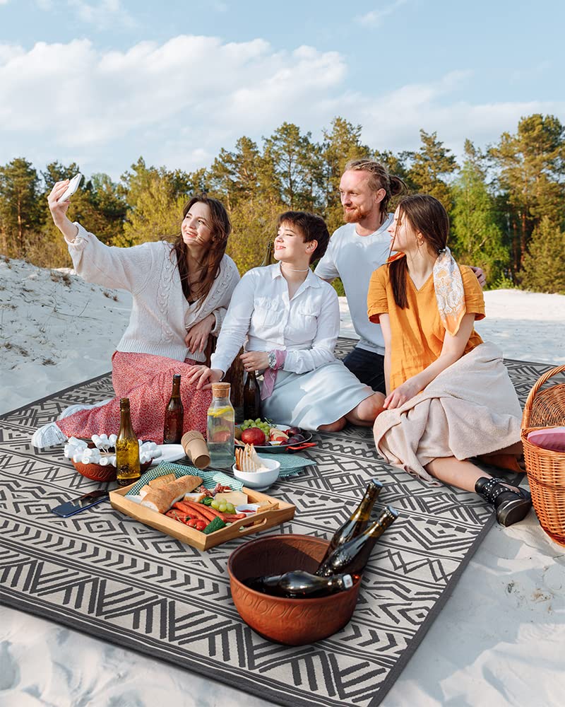 MontVoo Outdoor Rug 6x9 ft showing easy cleaning with hose