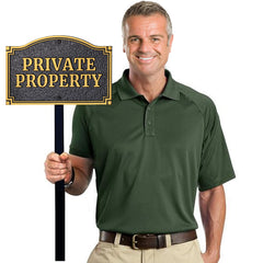 Morgtta Private Property Yard Sign displayed in a garden