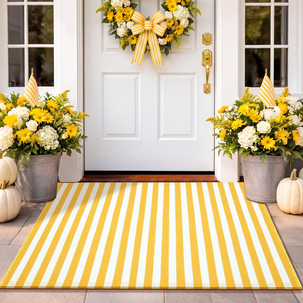 Moucuny 2' x 3' yellow and white striped outdoor rug front view