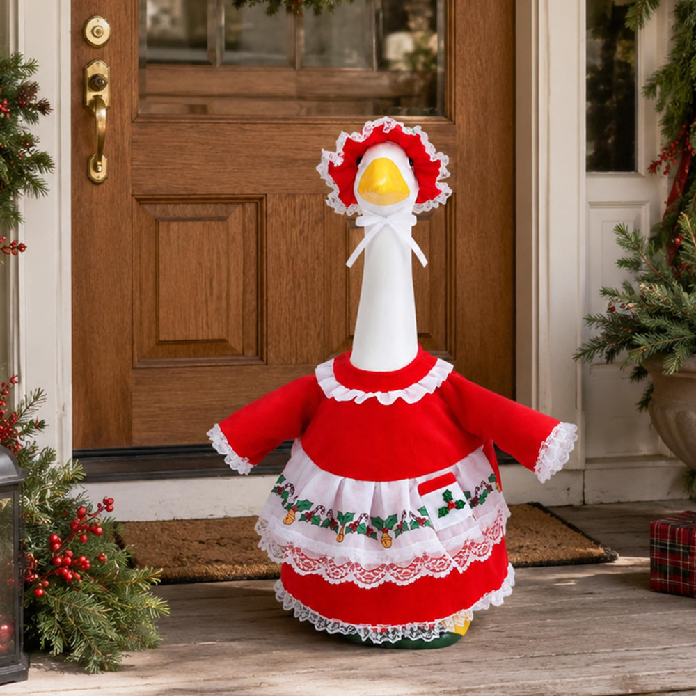 Mrs. Claus Goose Outfit on a lawn goose statue