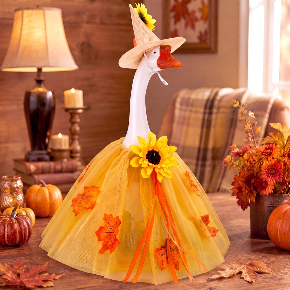 Multicolor fall goose costume close-up on a garden statue