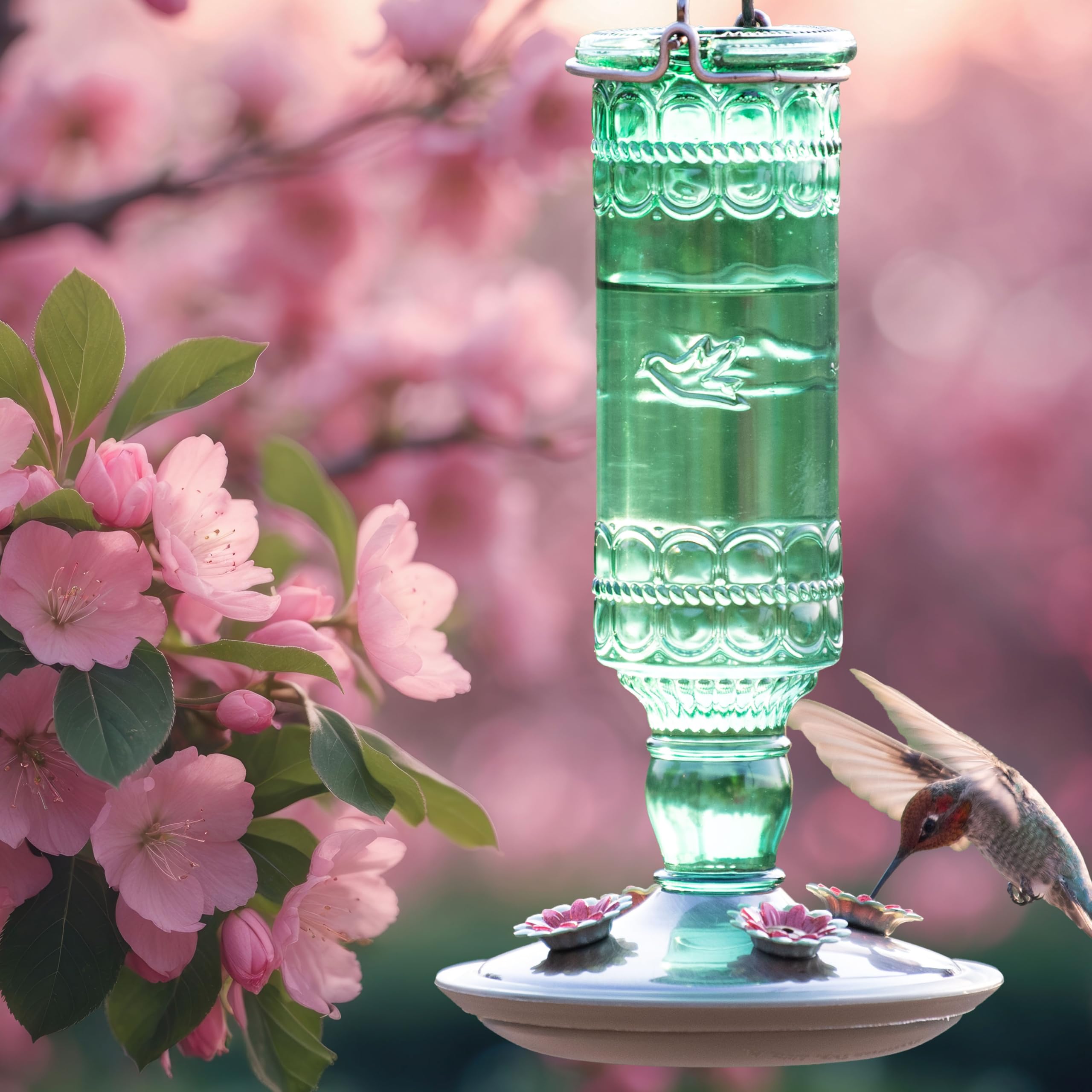 Multiple hummingbirds feeding at the Perky-Pet Antique Glass Hummingbird Feeder
