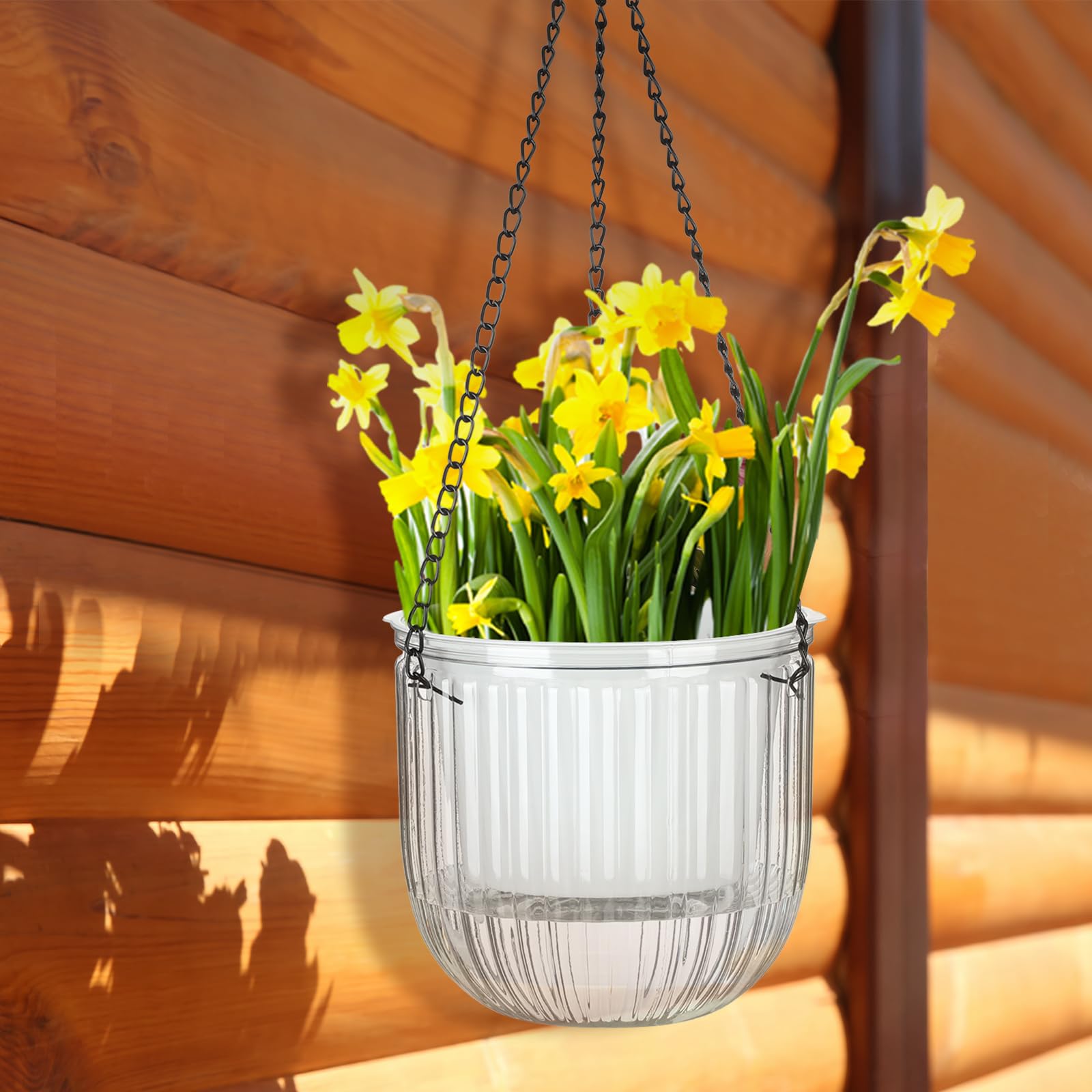 Multiple Maxcheck hanging planters displayed in a garden setting