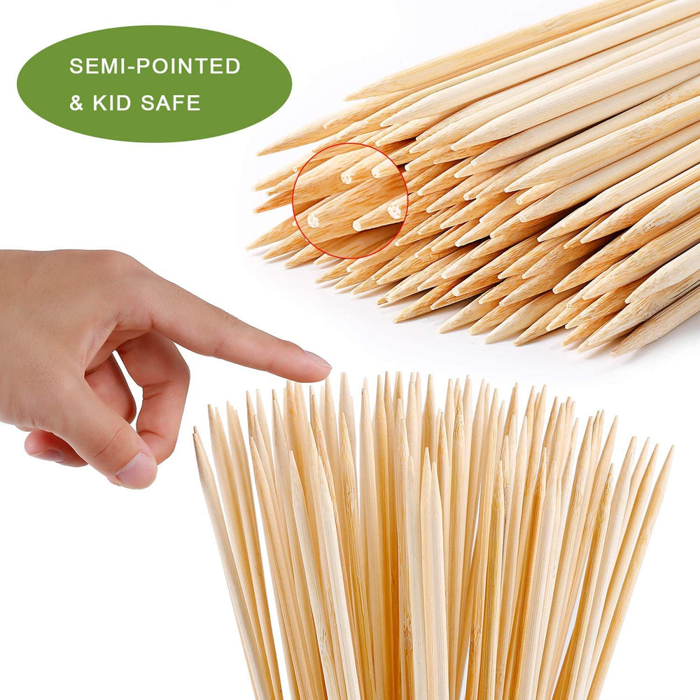 NadaKin bamboo roasting sticks by a campfire with marshmallows
