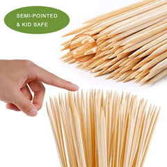 NadaKin bamboo roasting sticks by a campfire with marshmallows