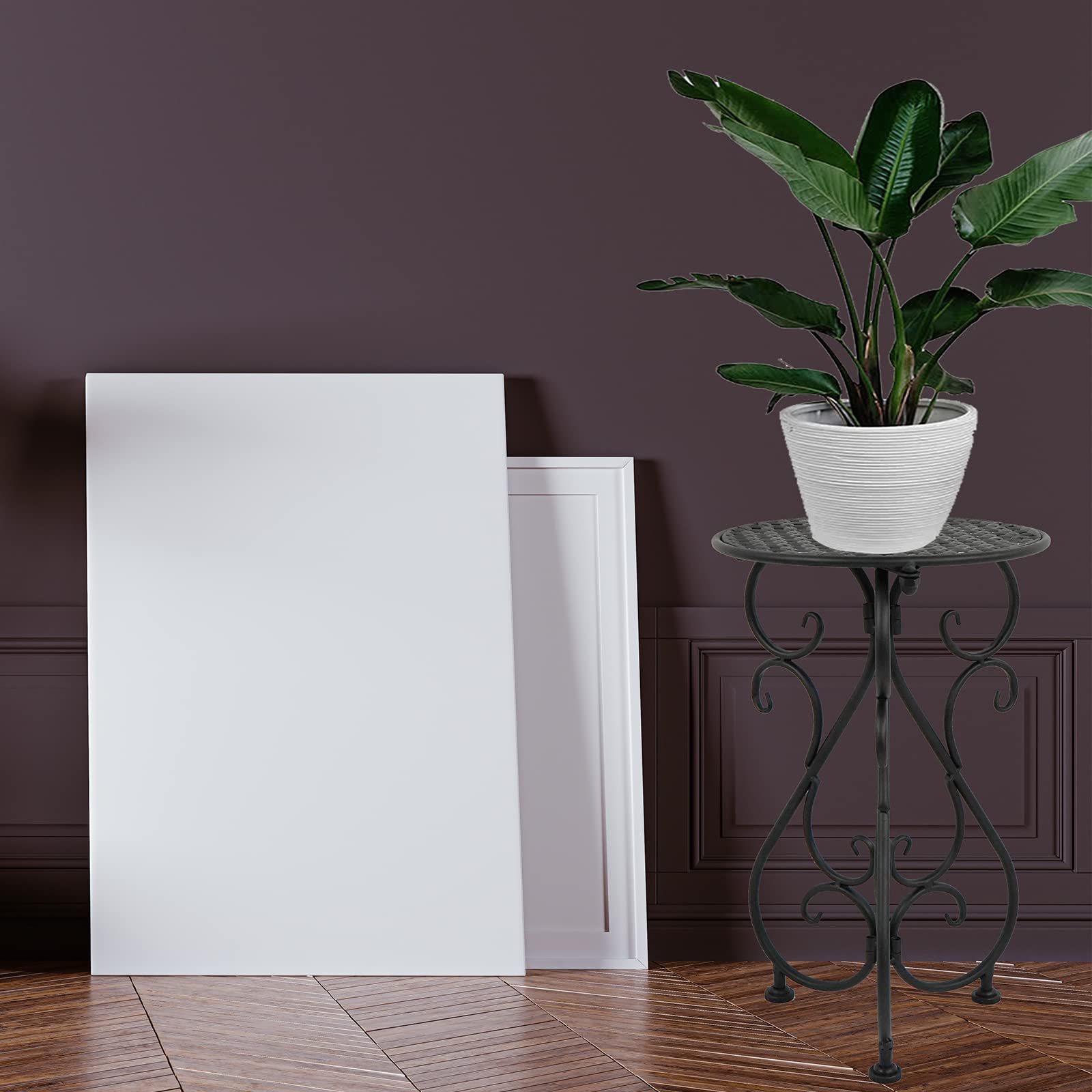 NAKUPE metal plant stand with multiple pots displayed