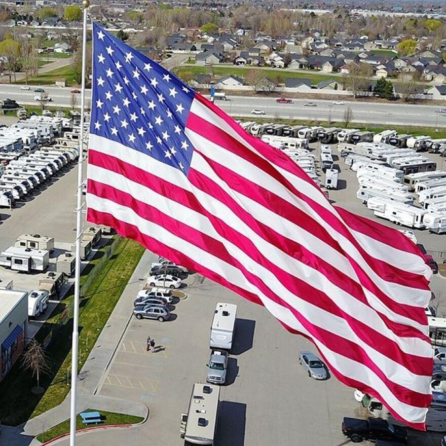 NatFlag 10x15 FT Heavy Duty Nylon US Flag front view with embroidered stars