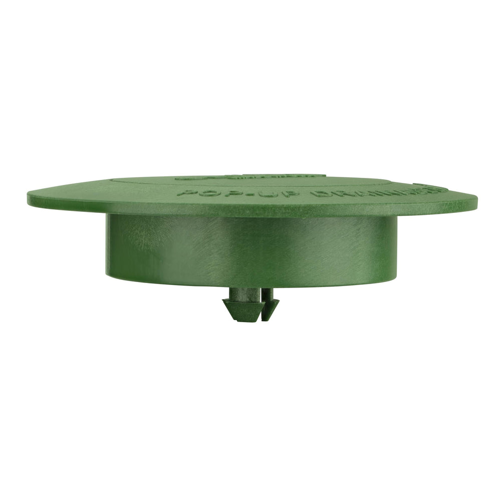 NDS Pop-Up Drainage Emitter installed in a lawn setting