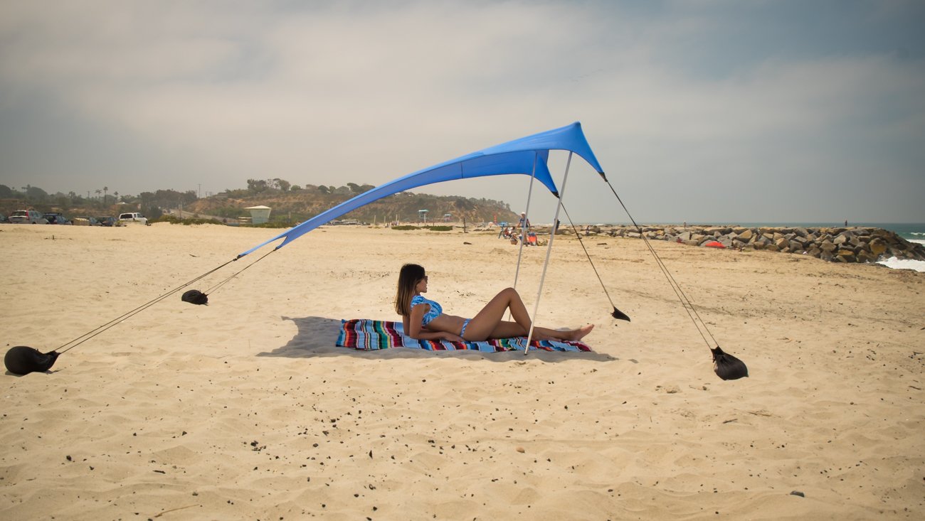 Neso Beach Tent setup on the beach with family