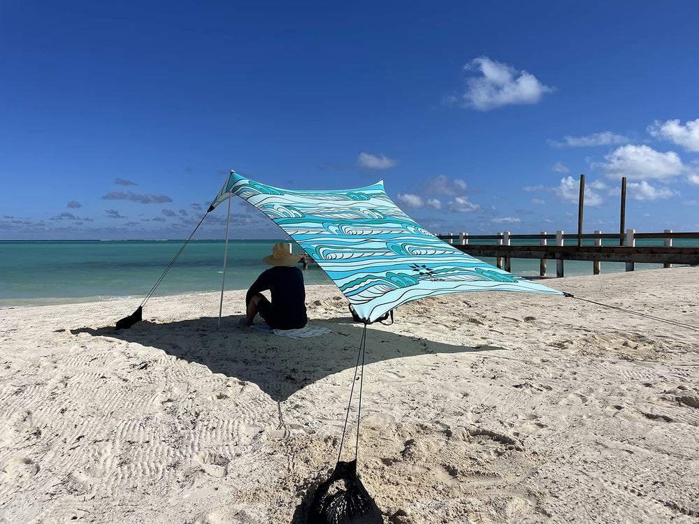 Neso Beach Tent setup with family at the beach