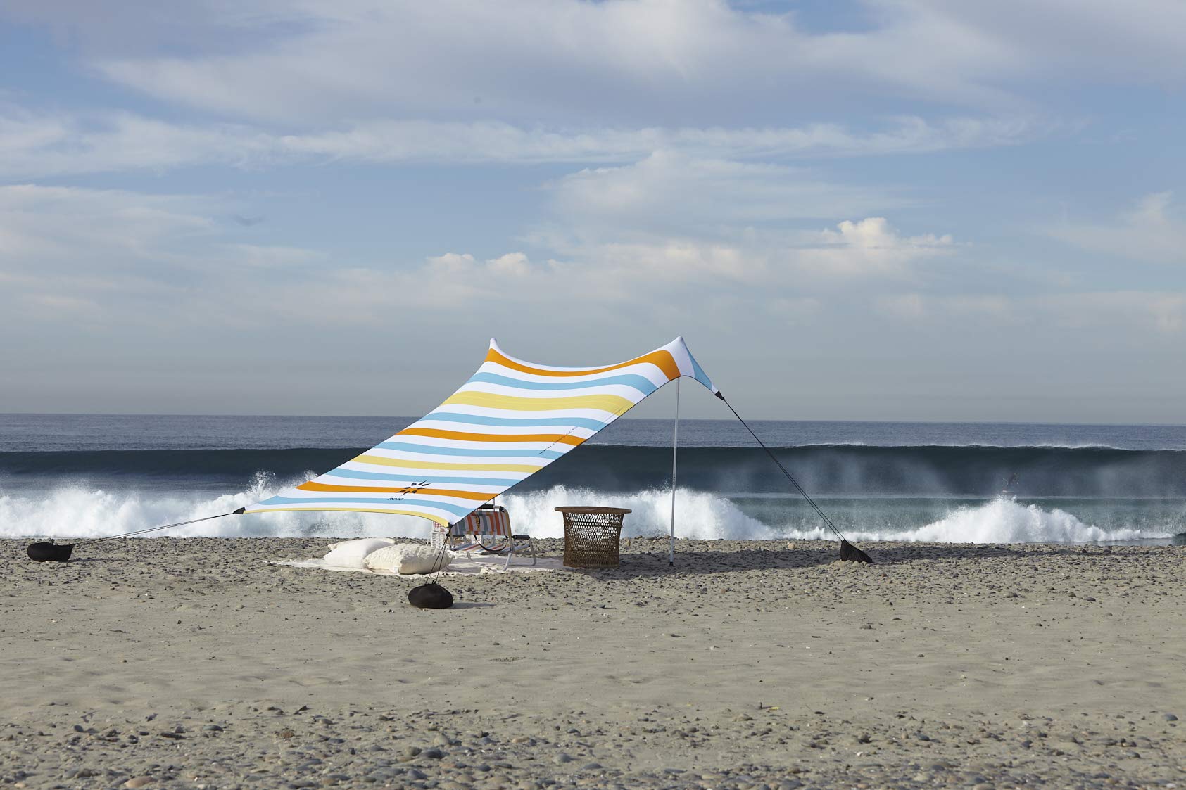 Neso Portable Beach Tent showing UPF protection label