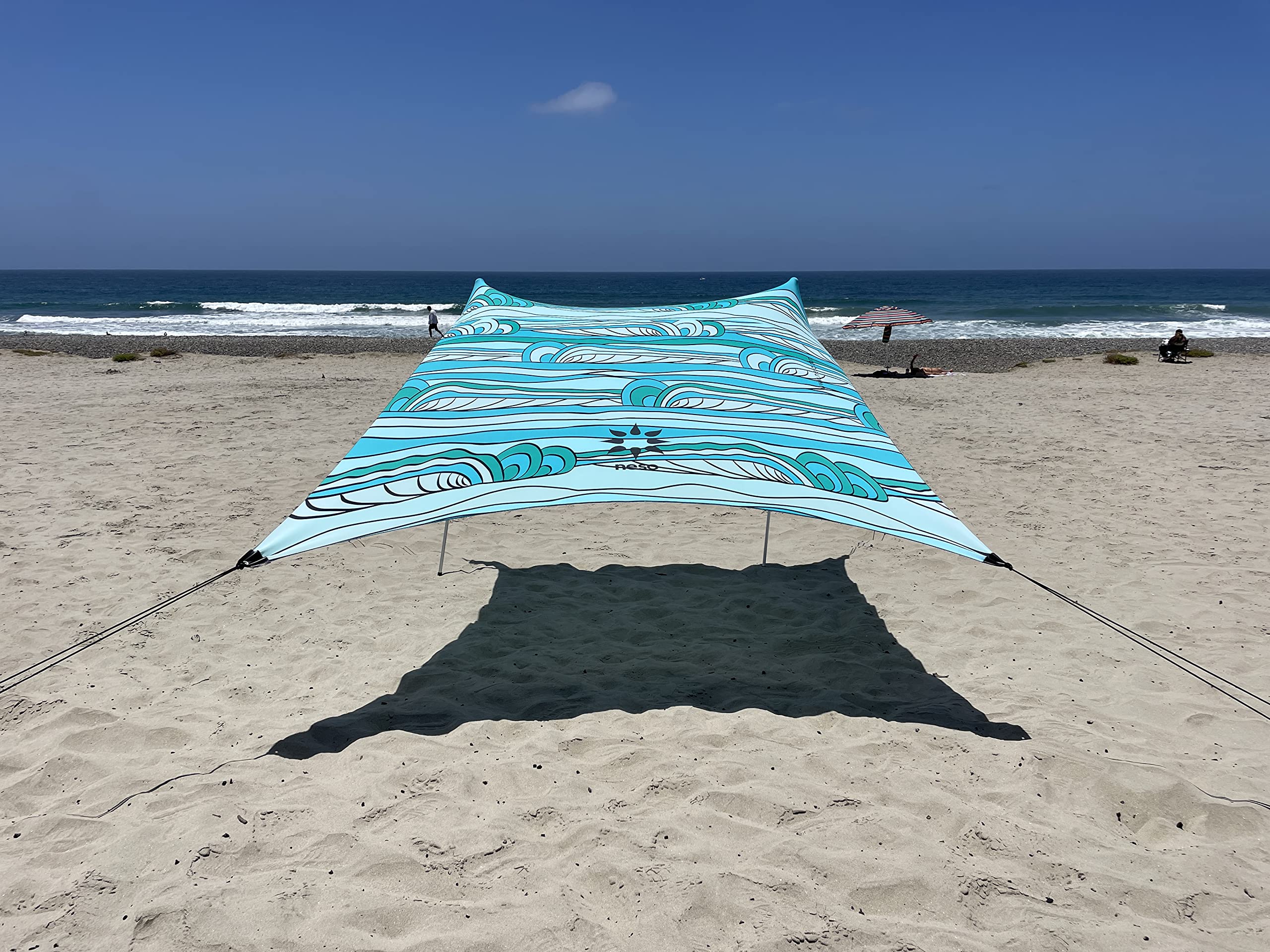 Neso Portable Beach Tent Swells model front view