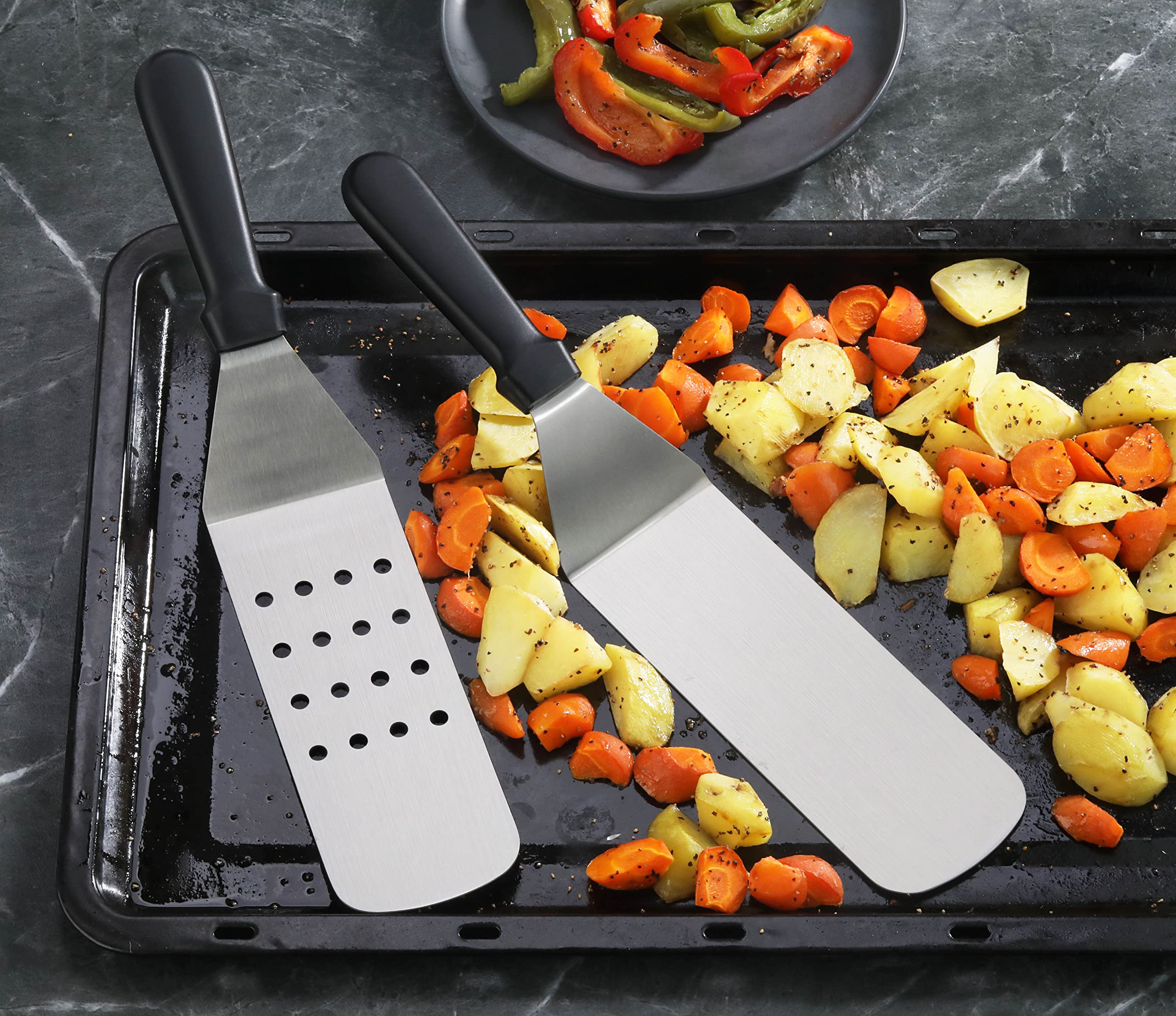 New Star Foodservice Grill Turner on grilling surface