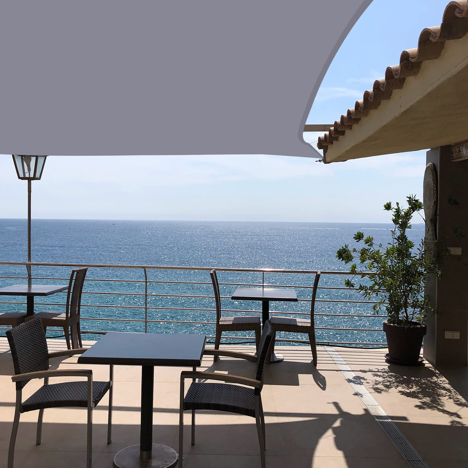 Neween shade sail showcasing its light grey colour outdoors