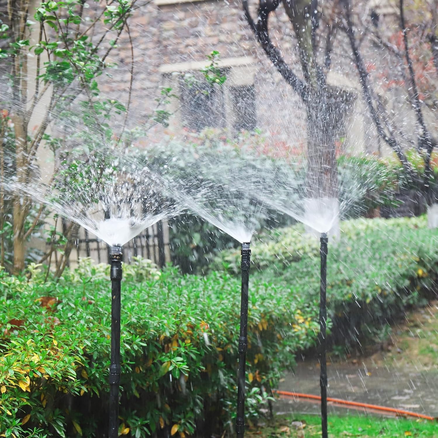 NFAMRZCAR 12Pcs Sprinkler Extensions laid out on a surface