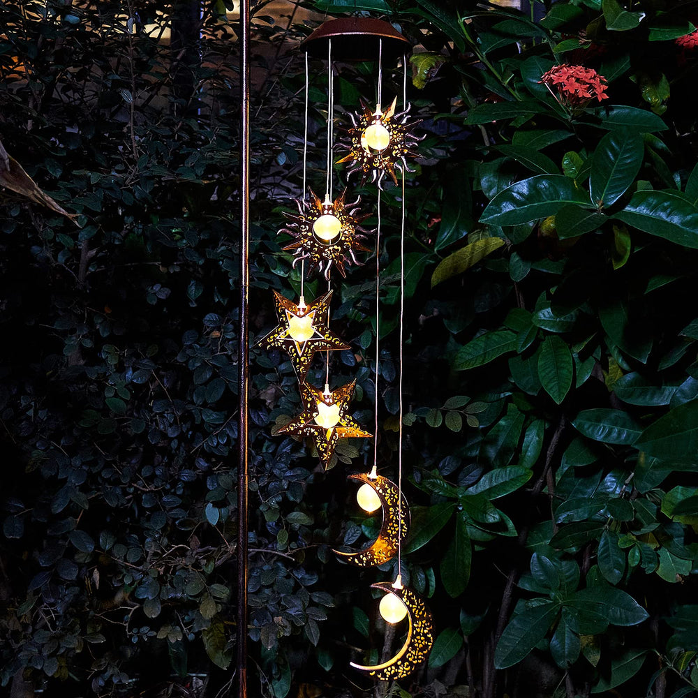 Night view of Tryme Solar Wind Chimes glowing