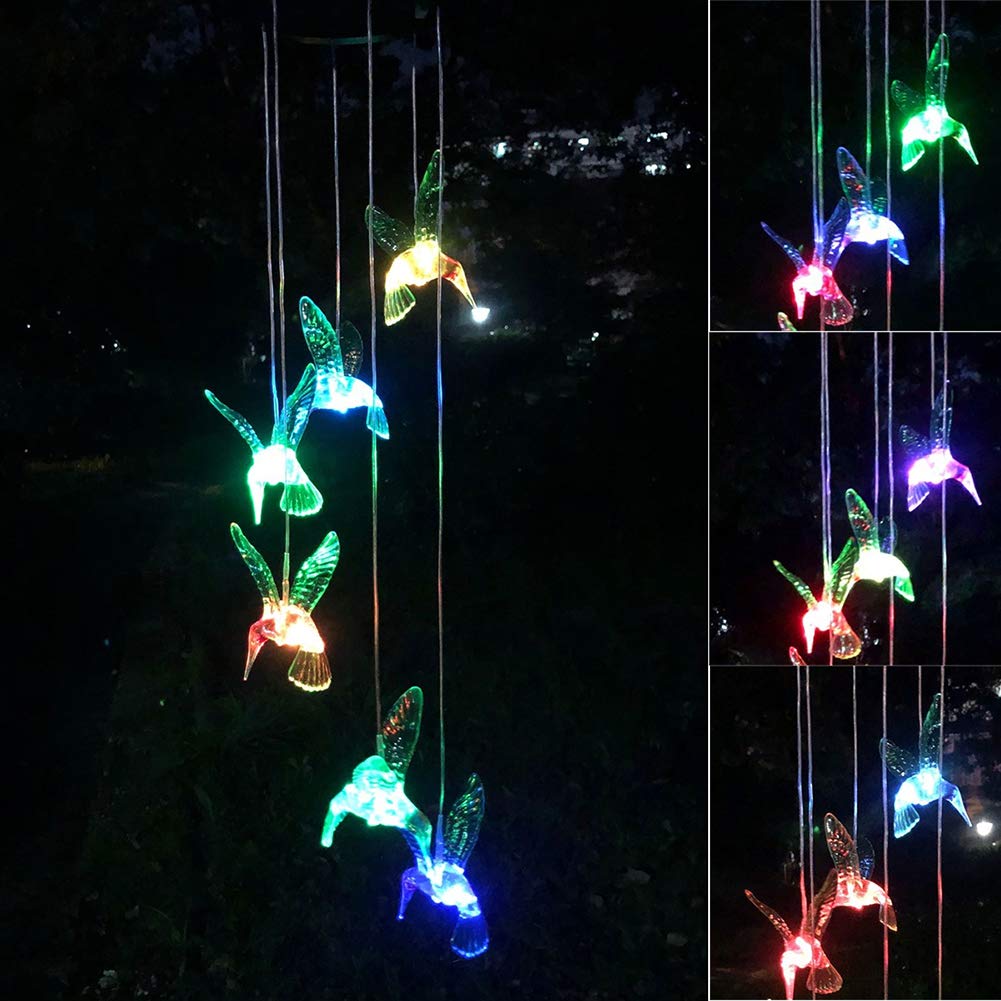 Nighttime view of Hummingbird Solar Chimes glowing