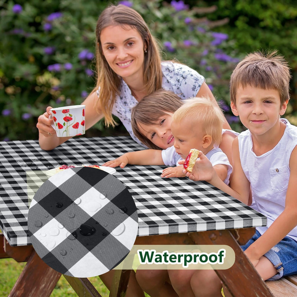 Nimalpal picnic table cover set displayed on a picnic table