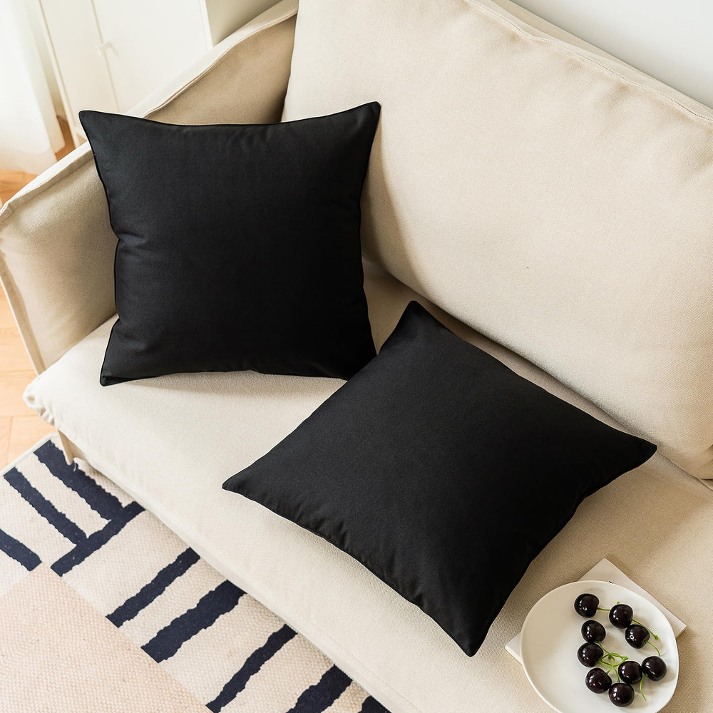 NiNi ALL black pillow cover showing water bead effect