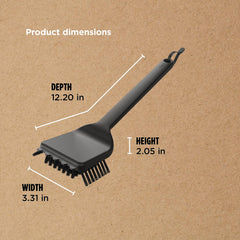 Ninja Woodfire Grill Cleaning Brush on a grill, demonstrating its use
