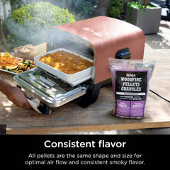Ninja Woodfire Pellets in use on a grill with smoky flavour