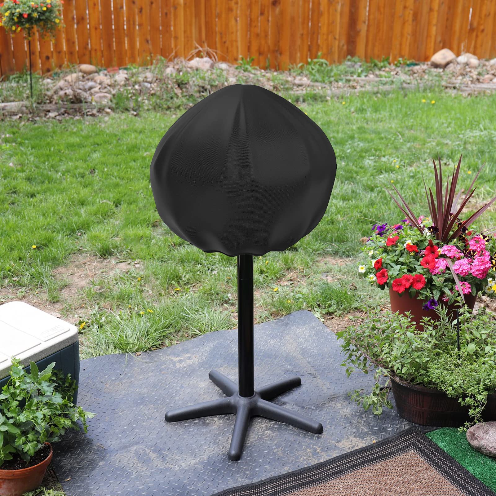 nomiou grill cover secured on grill in windy conditions