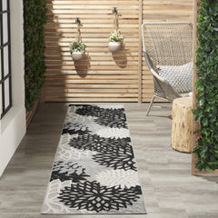 Nourison Aloha 2'3" x 10' area rug in black and white floral design