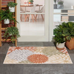 Nourison Aloha Area Rug displayed on a patio setting
