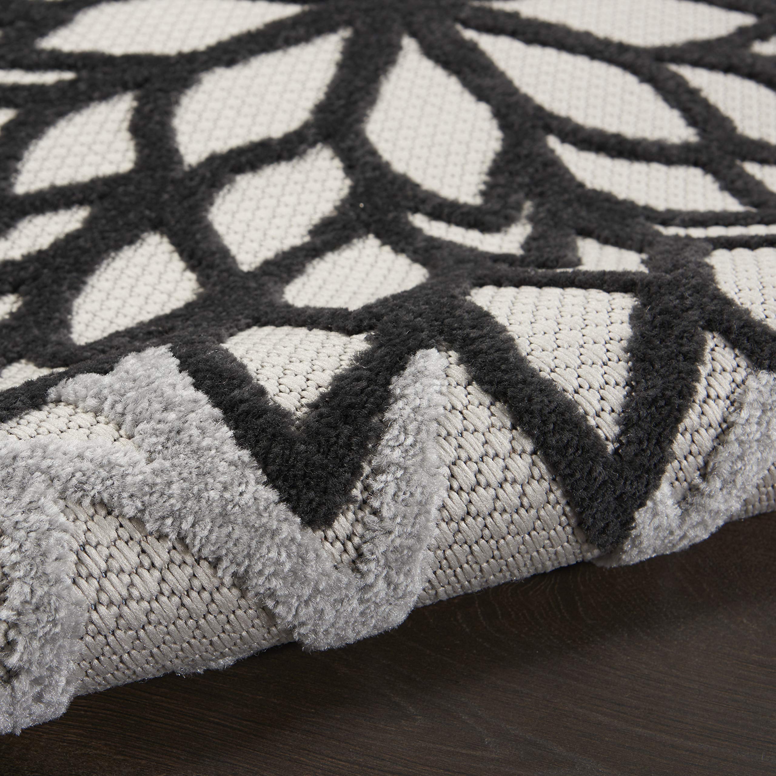 Nourison Aloha area rug rolled up for storage