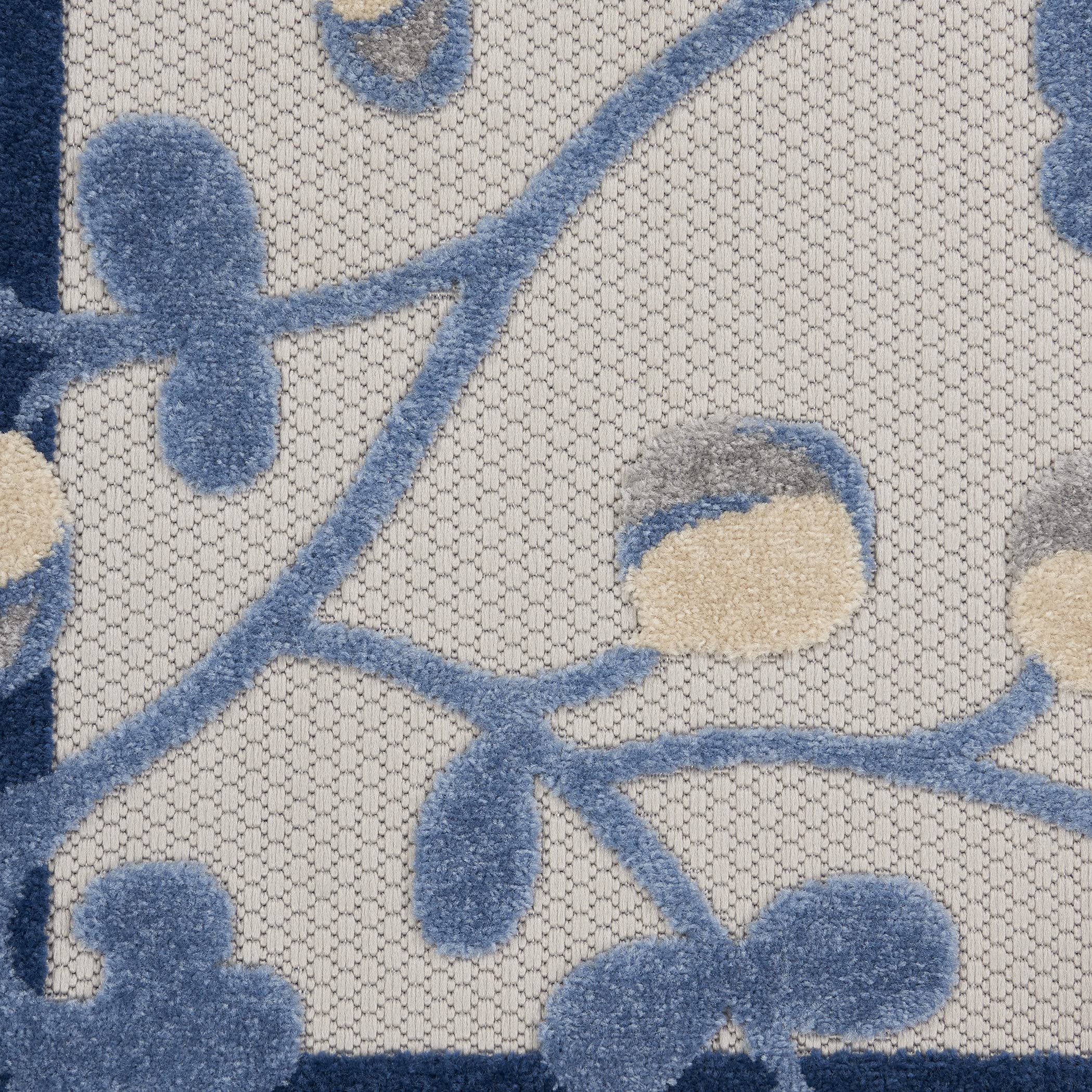 Nourison Aloha Blue Grey Area Rug in living room decor