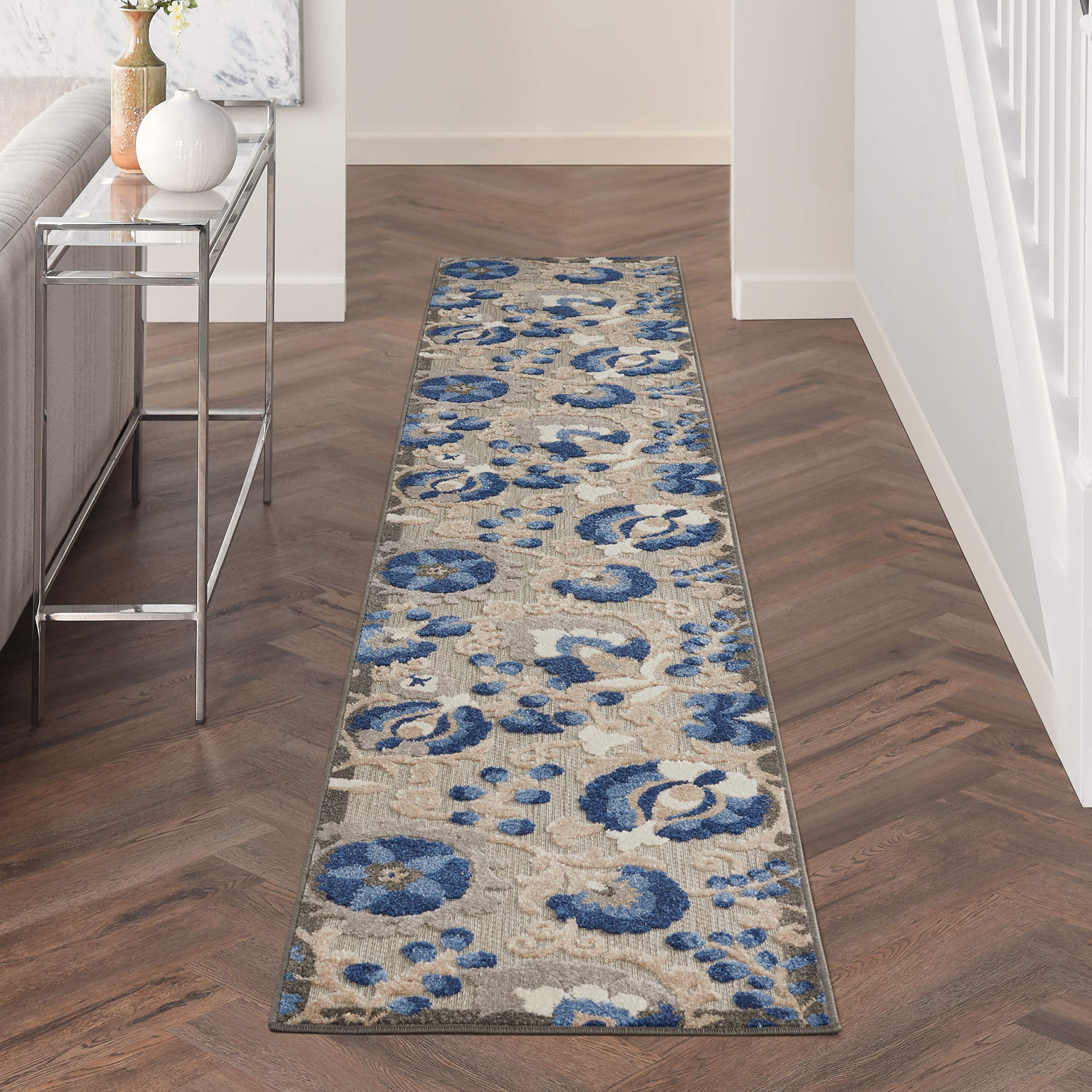 Nourison Aloha Natural Blue Area Rug in a living room