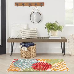 Nourison Aloha rug placed on a patio setting