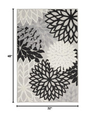 Nourison Aloha rug showing floral pattern and texture