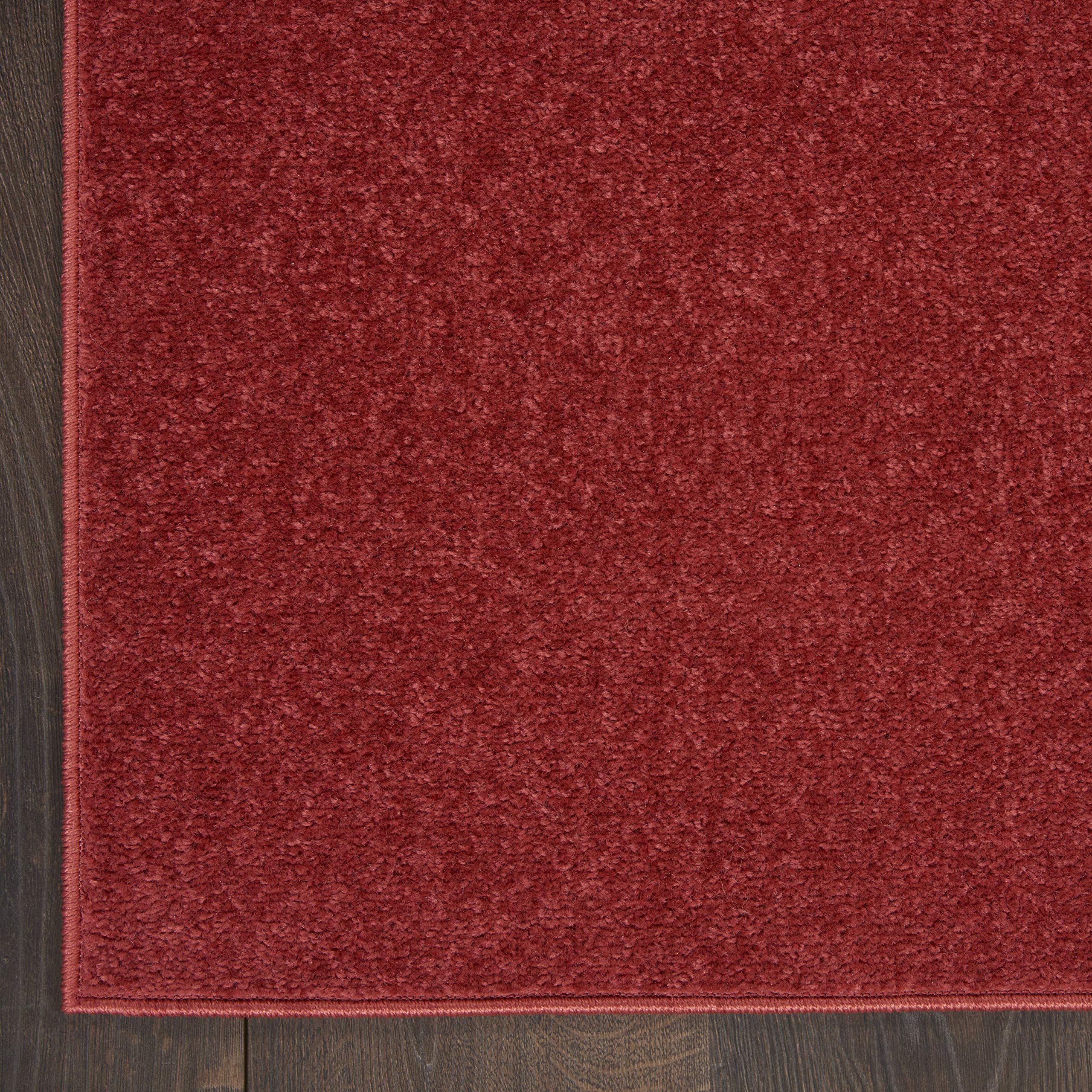 Nourison Brick Red Outdoor Runner Rug displayed indoors