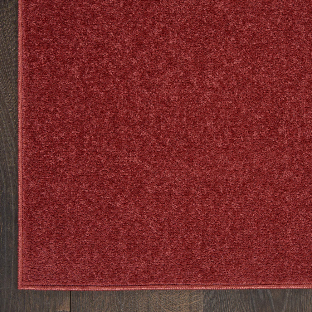 Nourison Brick Red Outdoor Runner Rug displayed indoors