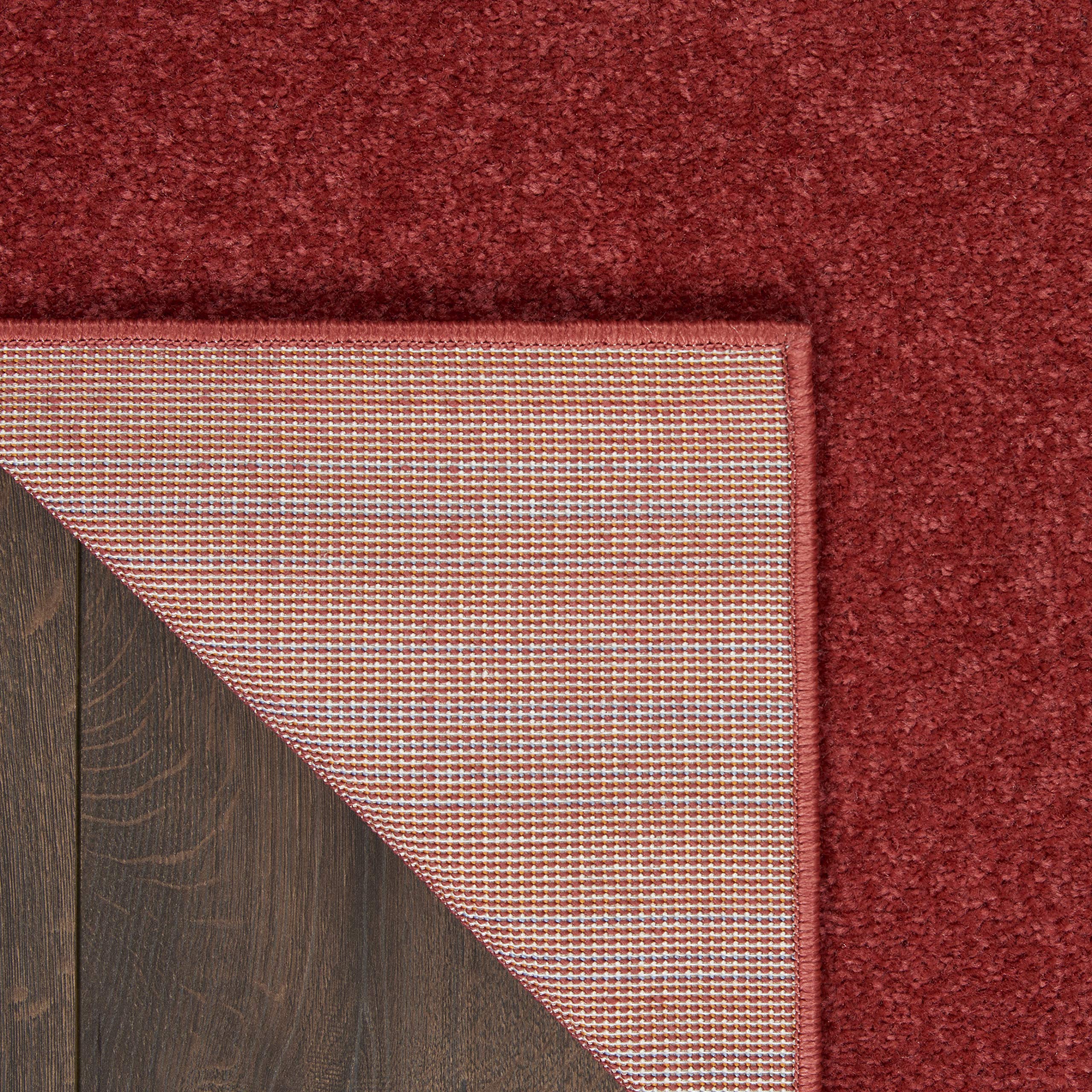 Nourison Brick Red Outdoor Runner Rug in living room setup