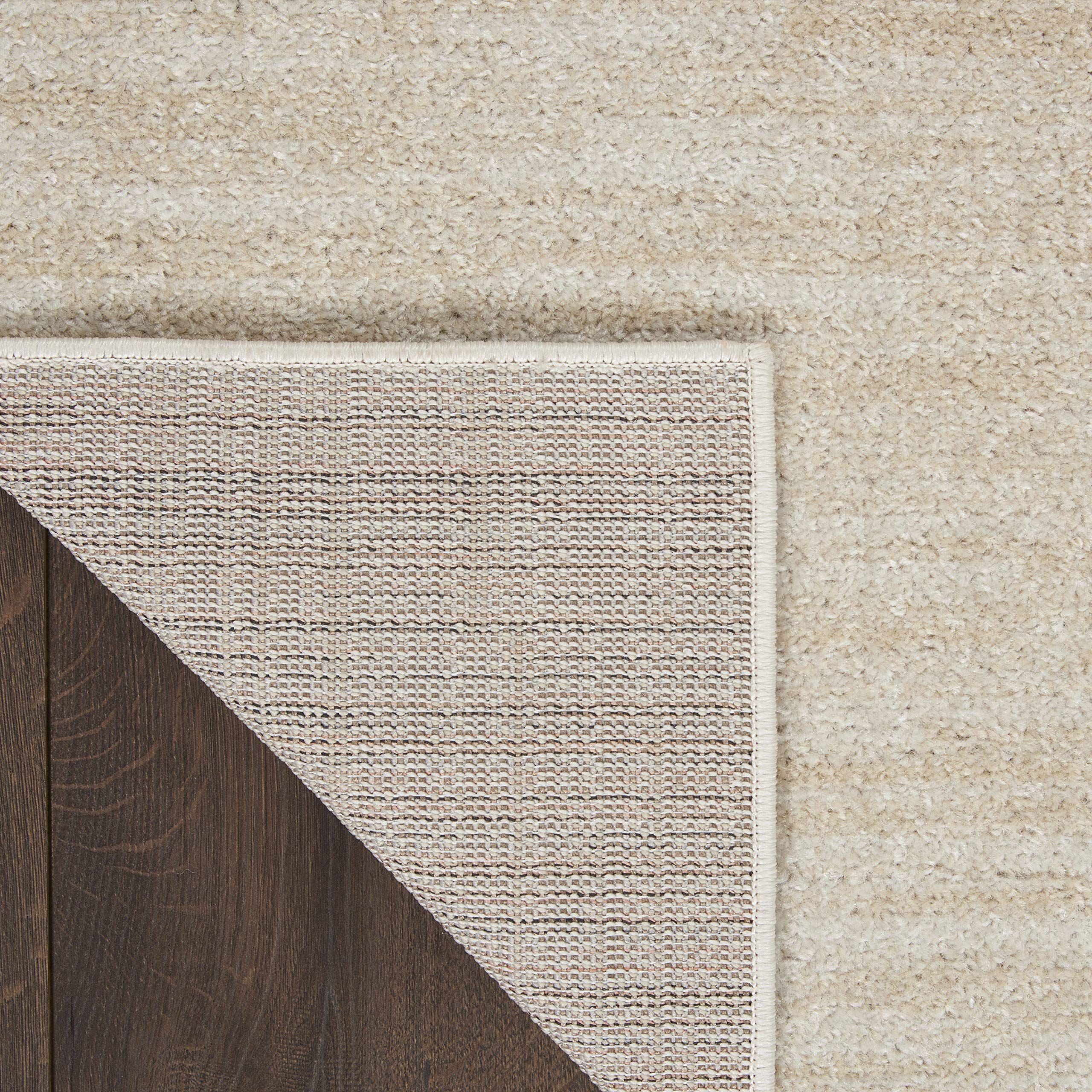 Nourison Essentials Area Rug 2' x 4' Ivory Beige close-up texture
