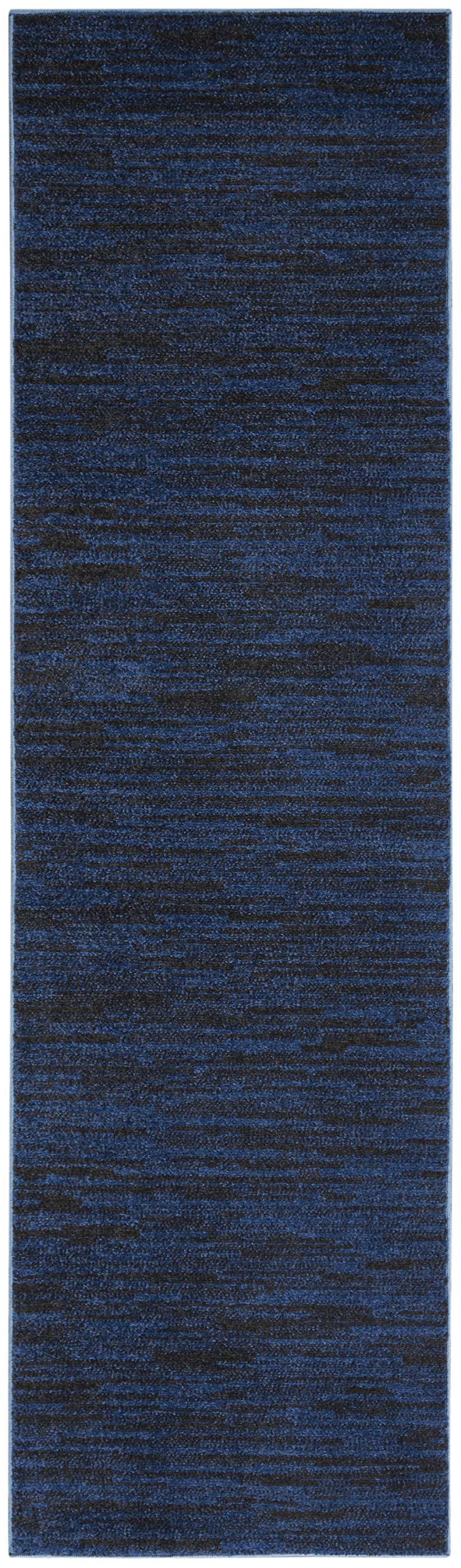 Nourison Essentials Area Rug in dining room setting