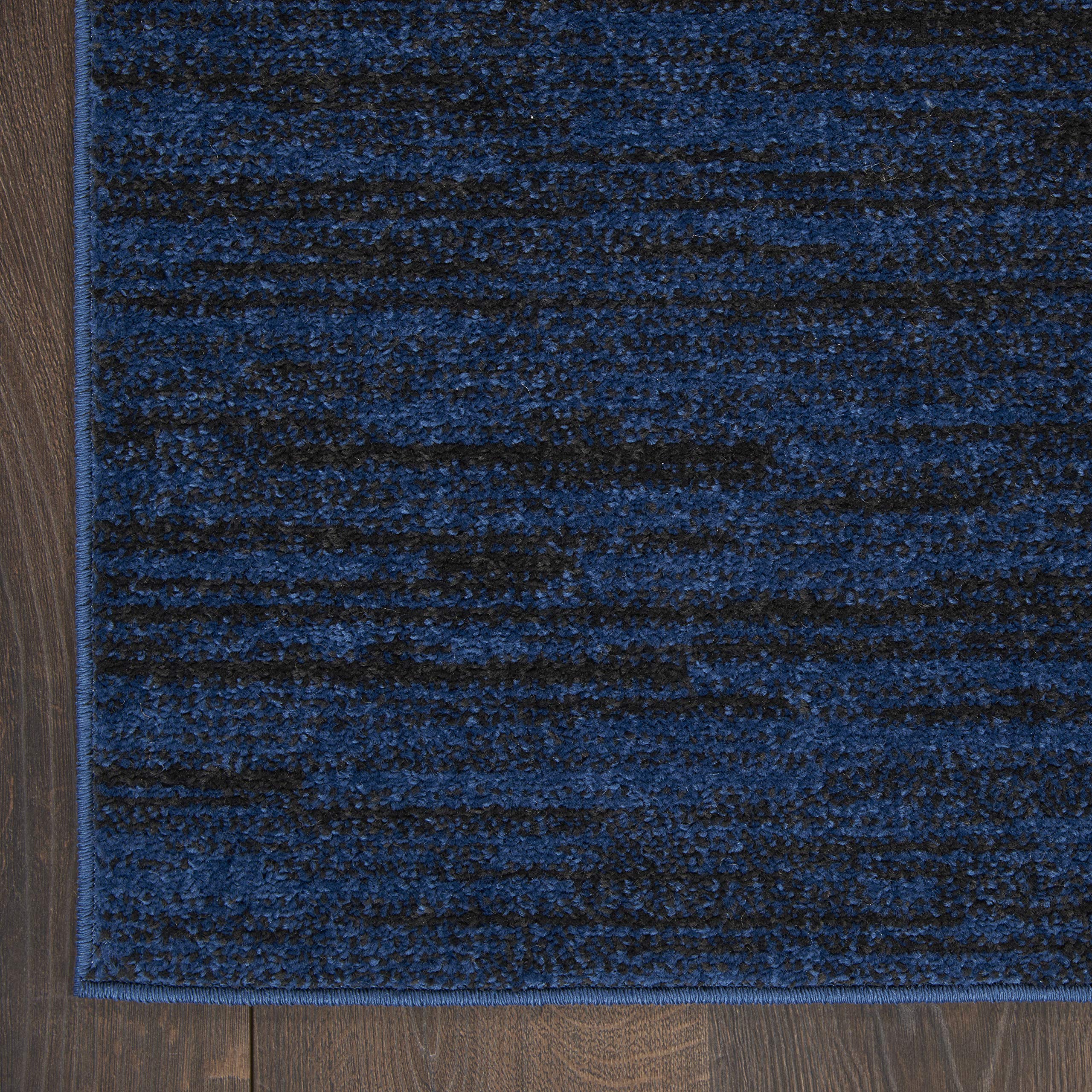 Nourison Essentials Area Rug placed in a living room