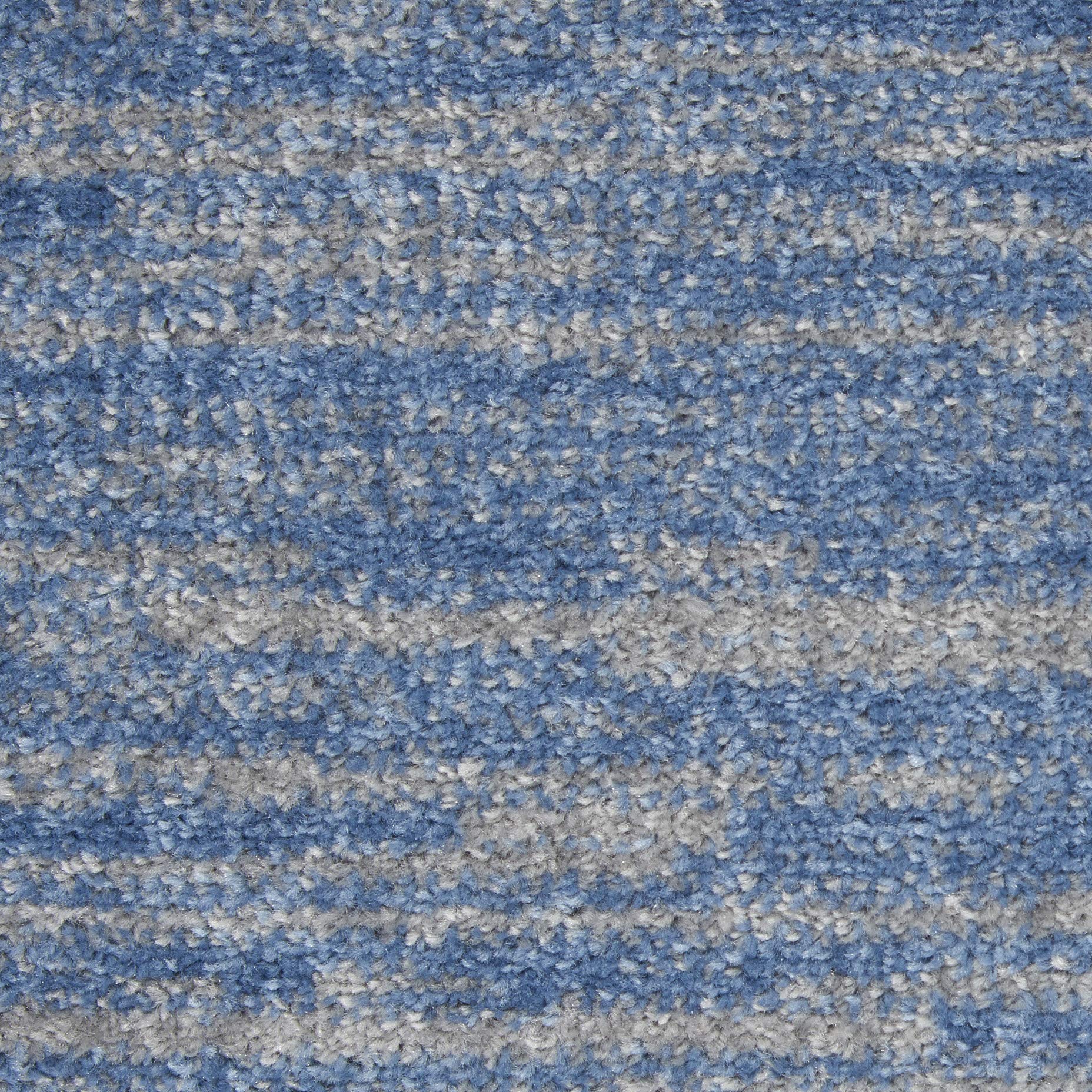 Nourison Essentials Blue Grey Area Rug in dining area