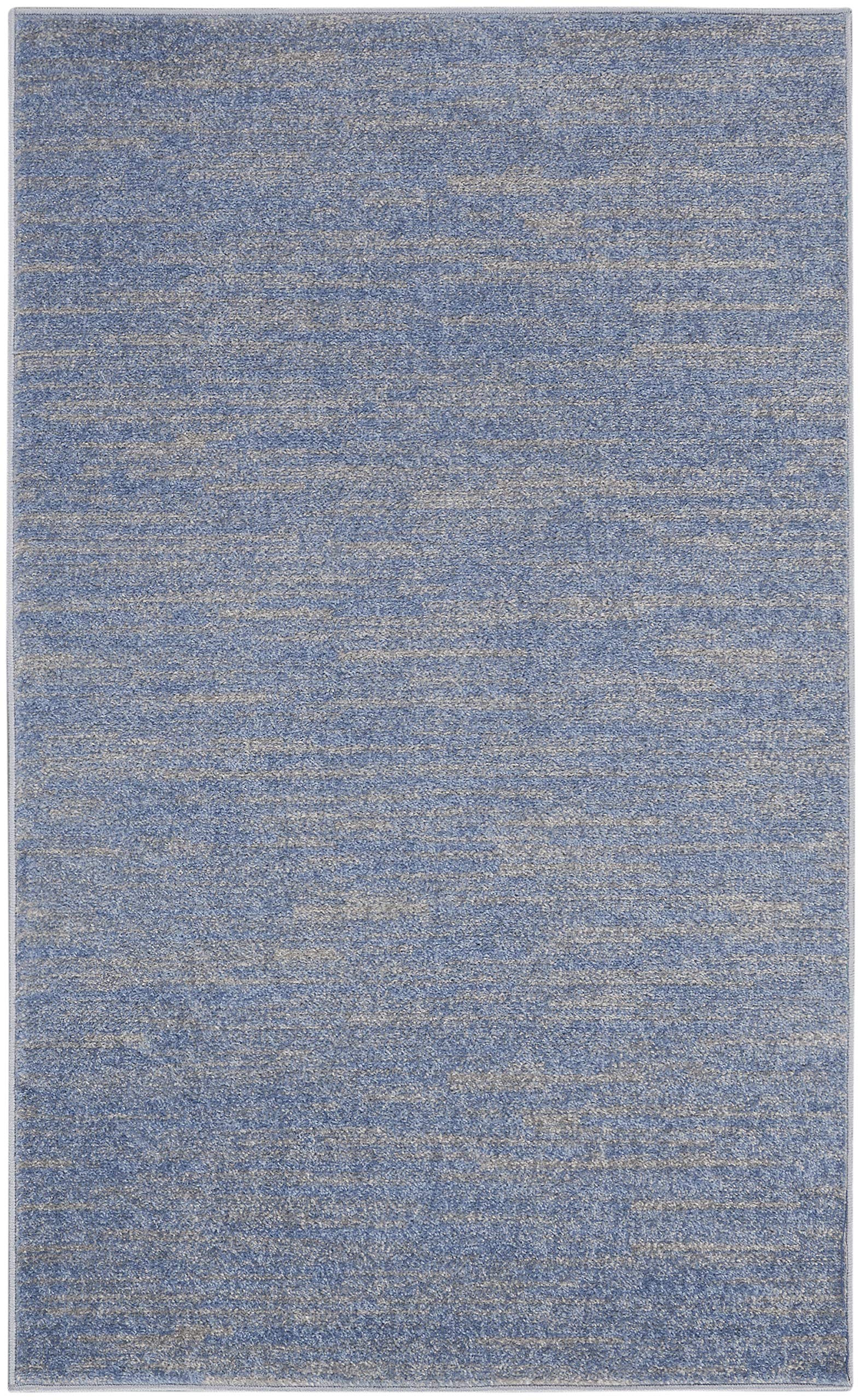 Nourison Essentials Blue Grey Area Rug near doorway